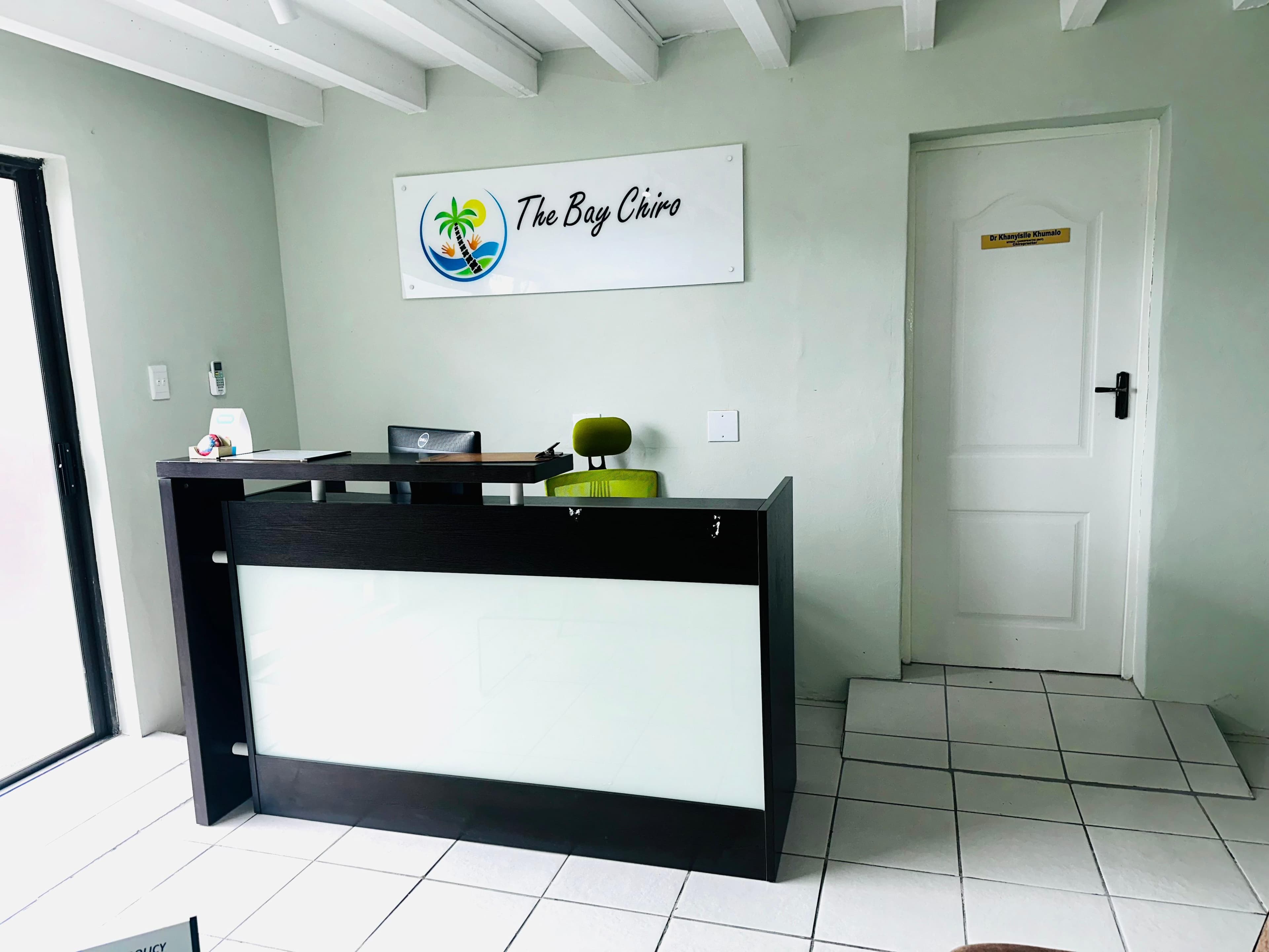 Dr K.P. Khumalo in the treatment room at The Bay Chiro